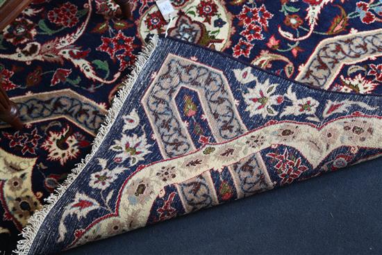 A Tabriz blue ground carpet, 410 x 272cm